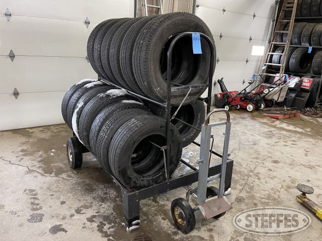 Moveable tire rack, assorted used tires, tire rack mover